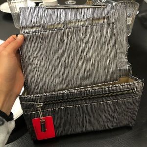 Silver Ivanka Trump Clutch Purse. ( 6in x 9 1/2 in) JB